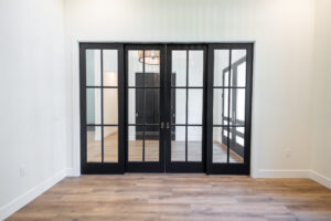 Custom black framed glass interior doors in Ocala Florida home