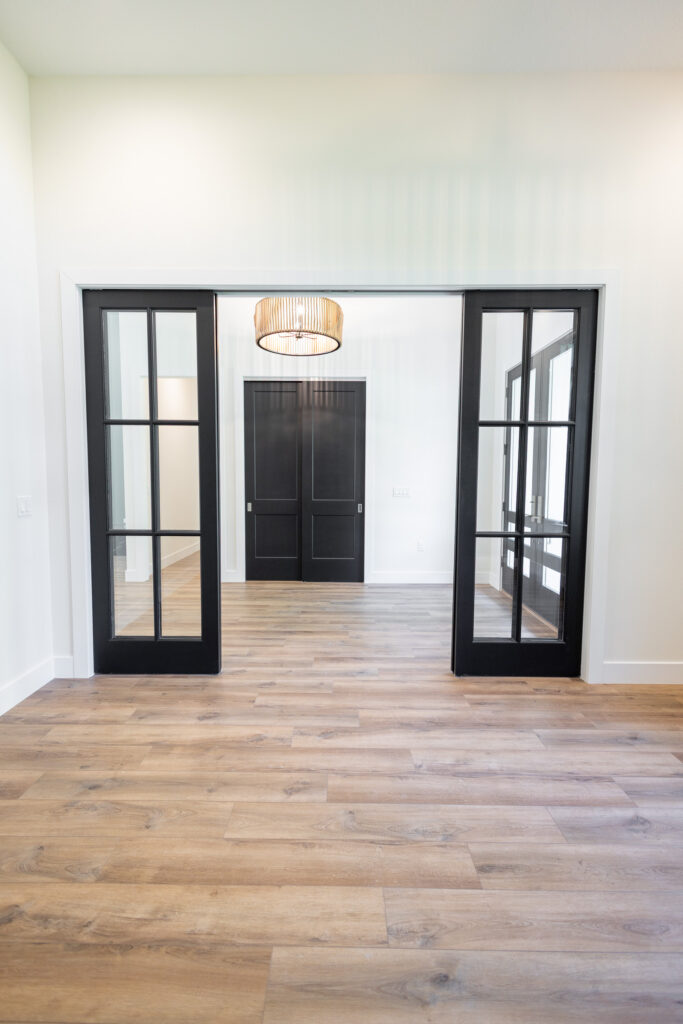 Black framed double French doors in Ocala Florida custom home