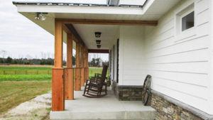 Rocking chairs on a farmhouse porch in Ocala, Florida