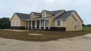 A modern farmhouse with porch in Ocala, Florida
